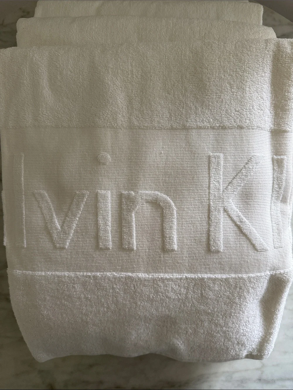 Calvin Klein Home Vintage White Scuplted Embossed Logo Towel 40 x 70